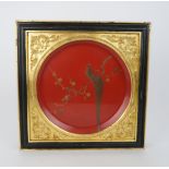 A JAPANESE RED LACQUERED DISH gilt with a cockerel perched on a blossoming branch, within a square