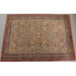 *WITHDRAWN* A CREAM GROUND PERSIAN TEHERAN RUG with floral all over design featuring stylized big
