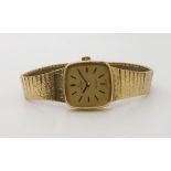 A 9CT GOLD LADIES OMEGA DE VILLE with integral textured strap. Dimensions of the case 2cm x 2cm,