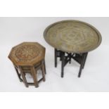 AN EARLY 20TH CENTURY BRASS TOPPED FOLDING BENARES TABLE inlaid with copper and steel depicting