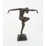 AN ART DECO STYLE BRONZE OF A DANCER modelled with arms horizontal, incised D.S., 30cm high