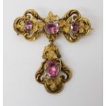 A VICTORIAN BROOCH with leaf and vine motifs throughout, the pendant drop is removable. set with