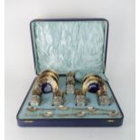 A BOXED SET OF AYNSLEY COFFEE CANS AND SAUCERS  the cans with silver mounts, hallmarked for
