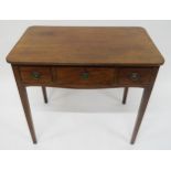 A GEORGIAN MAHOGANY THREE DRAWER WRITING TABLE on square tapering supports, 72cm high x 81cm wide