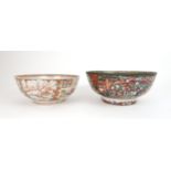 A CHINESE EXPORT FAMILLE ROSE PUNCH BOWL painted with panels of figures at various pastimes,