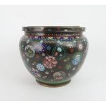 A JAPANESE CLOISONNE BOWL decorated with floral roundels, 23cm high and 26cm diameter Condition