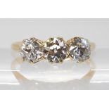 A THREE STONE DIAMOND RING set with estimated approx, 1.78cts of old cut diamonds in classic crown