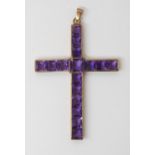 A GOLD & AMETHYST CROSS the square cut amethysts are set into a galleried mount, stamped 9c to the