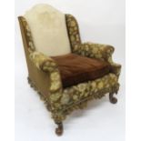 AN EARLY 20TH CENTURY HOWARD & SONS GEORGIAN STYLE WINGBACK ARMCHAIR stamped "19762005 HOWARD & SONS