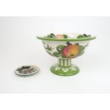 A WEMYSS FOOTED BOWL painted with apples within a green rim, impressed mark to base, 14cm high,