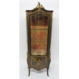 A FRENCH KINGSWOOD BOMBE VITRINE with gilt metal mounts and painted panel depicting lady and
