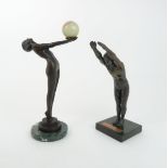 AN ART DECO STYLE BRONZE modelled as a naked girl holding an onyx ball, 32cm high, together with a