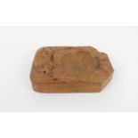 ROBERT MOUSEMAN THOMPSON A rectangular oak ashtray carved with signature mouse, 10cm Condition