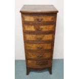 A 20th century walnut bow front chest of six drawers, 110cm high x 46cm wide x 43cm deep Condition