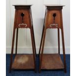 A pair of late Victorian Liberty style Arts & Crafts plant stands, 87cm high (2) Condition Report: