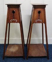 A pair of late Victorian Liberty style Arts & Crafts plant stands, 87cm high (2) Condition Report: