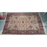 A 20th century eastern style floral pattern rug, 310cm long x 195cm wide Condition Report: