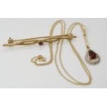 A 9ct gold ruby set bar brooch, length 5.5cm, together with a 9ct gold garnet and diamond accent