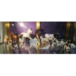 A collection of Beswick animals including Ayrshire Bull Ch Whitehill Mandate, sheep, hounds,