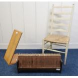 A early 20th century oak book trough with a selection of the "Punch Library of Humour", painted