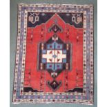 A red ground eastern prayer rug Condition Report:Available upon request
