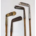 A BRASS HEAD GOLF PUTTER probably home made, hickory shaft, 88cm long, Brand Royal Crown putter,