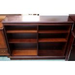 A 20th century mahogany open bookcase, 92cm high x 122cm wide x 31cm deep Condition Report:Available