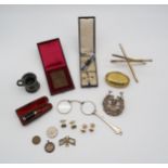 A mixed lot to include a brass coal miners twist box, a pair of Murat cufflinks, a school football