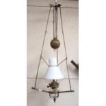 A 19th century brass rise and fall ceiling oil lamp Condition Report:Available upon request
