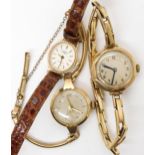 A 9ct ladies watch, together with two 9ct gold ladies watch heads, one with a rolled gold strap