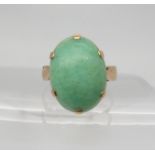 A 9ct gold green hardstone ring, size K1/2, weight 3.3gms Condition Report:Available upon request