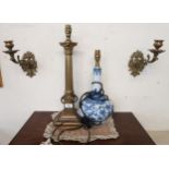 A lot of two contemporary table lamps and a pair of brass candle sconces (4) Condition Report:
