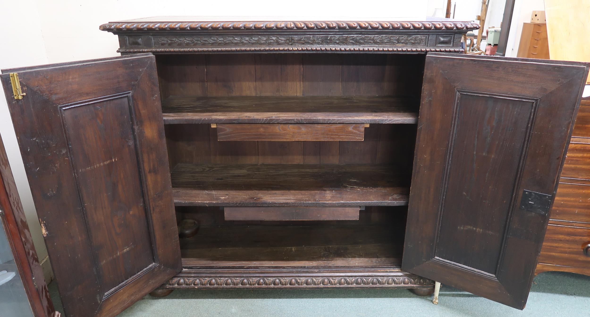 A Victorian stained oak two door cabinet, 133cm high x 148cm wide x 58cm deep Condition Report: - Bild 3 aus 3