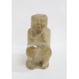 An Egyptian stone seated figure Condition Report:Available upon request