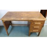 A 20th century oak writing desk, 72cm high x 122cm wide x 60cm deep Condition Report:Available