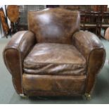 A 20th century "Halo" brown leather upholstered club armchair, 93cm high x 95cm wide x 90cm deep