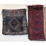A lot of two eastern handwoven saddle bags (2) Condition Report:Available upon request