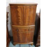 A 20th century mahogany bow front drinks cabinet, 129cm high x 62cm wide x 44cm deep Condition