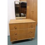 A mid 20th century teak Meredew four piece bedroom suite to consist two door wardrobe, six drawer