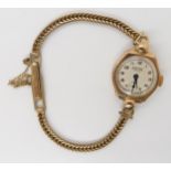 A 9ct gold Astin watch head and herringbone chain strap, weight including mechanism 15.2gms