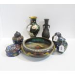 A collection of cloisonné items including a dragon decorated bowl,  a pair of pots, other pots and a