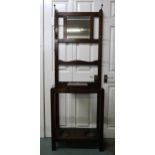 A 20th century oak mirror back hall stand and mahogany five tier corner what-not (2) Condition