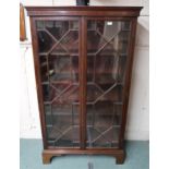 An early 20th century mahogany two door astragal glazed bookcase, 169cm high x 96cm wide x 40cm deep