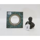 A small bronze bust of a man and a mosaic and paste set frame Condition Report:Available upon