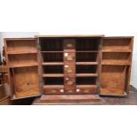 An early 20th century mahogany fitted work cabinet, 82cm high x 80cm wide x 53cm deep Condition