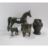 An antique style bronze horse, another, a koro and a vase Condition Report:Available upon request