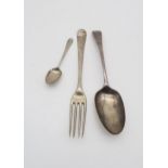 A George II silver table spoon, in the Old English pattern, London 1739, a silver tea spoon and