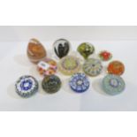 A Perthshire paperweight and assorted other paperweights Condition Report:Available upon request