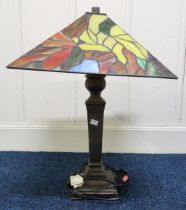 A 20th century brass base table lamp with Tiffany style shade Condition Report:Available upon