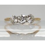 An 18ct gold three stone diamond ring, set with estimated approx 0.60cts of old cut diamonds, finger